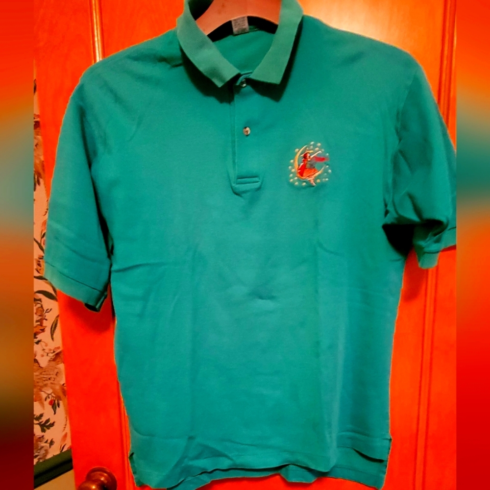 Miller Brewing teal green polo. L Color in close up is true. All cotton